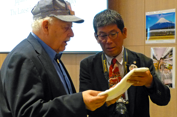 Mr. Sakurai introducing railway memorabilia	